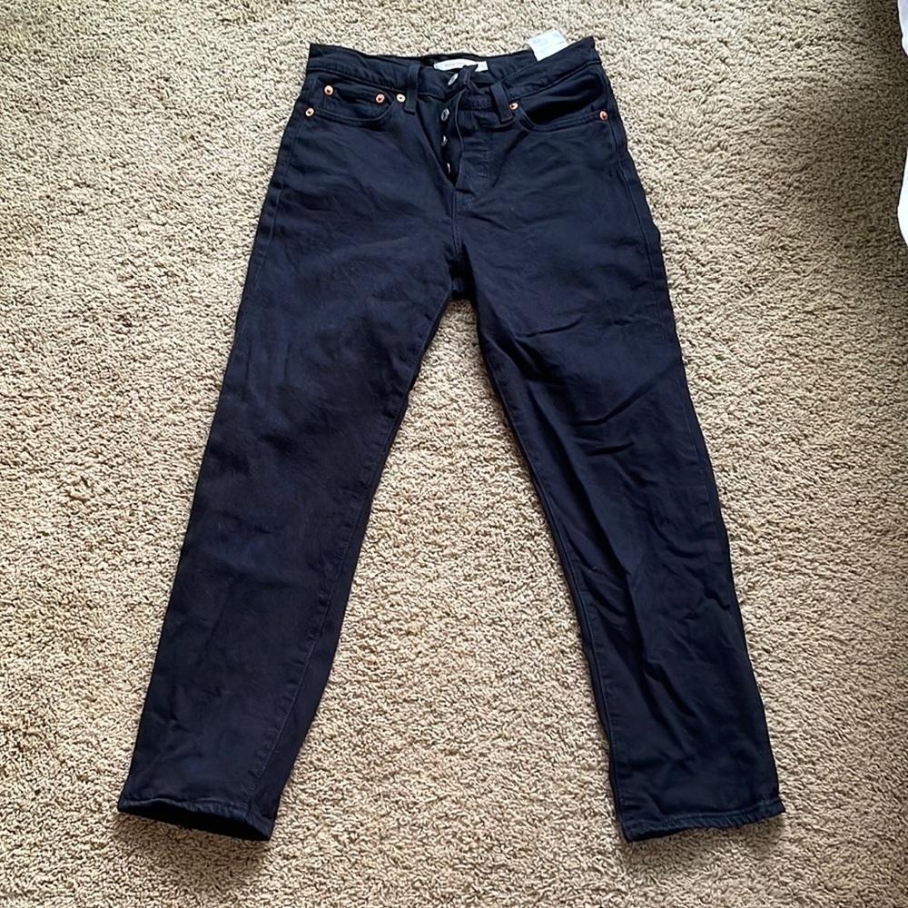 Black straight Levi’s jeans